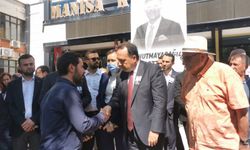 Besim Dutlulu ilk tebrikleri meclis çıkışında kabul etti