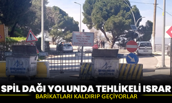 Spil Dağı yolunda tehlikeli ısrar: Barikatları kaldırıp geçiyorlar