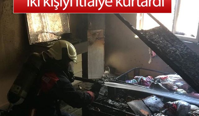 Yangında mahsur kalan iki kişiyi itfaiye kurtardı