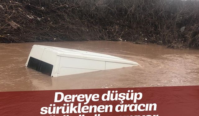 Dereye düşüp sürüklenen aracın sürücüsü aranıyor